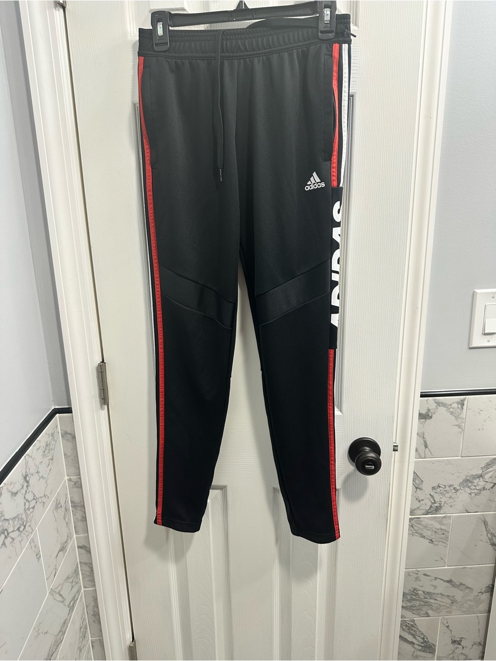 adidas Women’s Tiro Black with Red Side Stripes